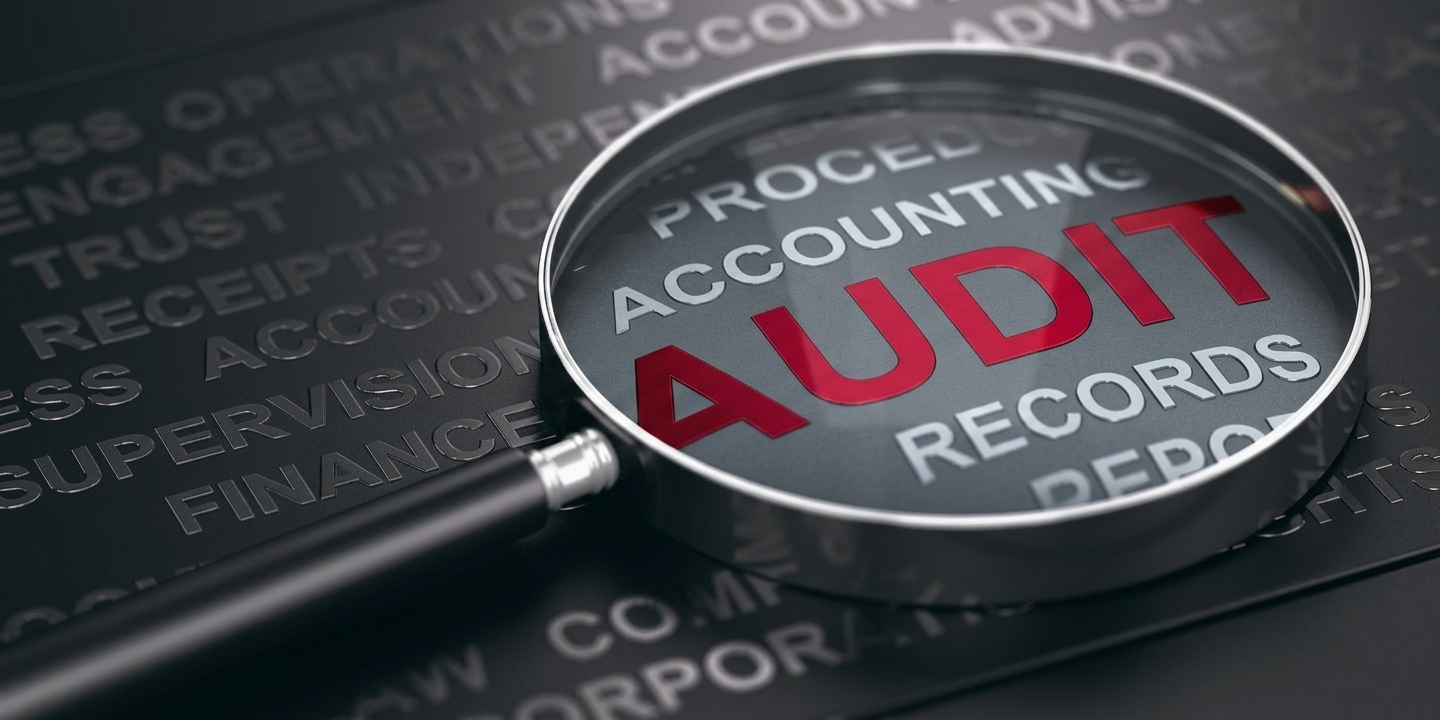 Magnifier over the word audit above accounting records and procedures